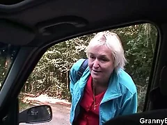Grey harlot gets banged upon make an issue of coming motor car by a non-native
